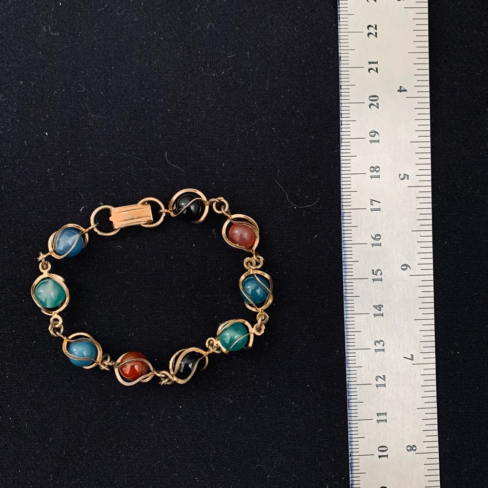 VINTAGE GOLD TONE CAGED CHAKRA BRACELET